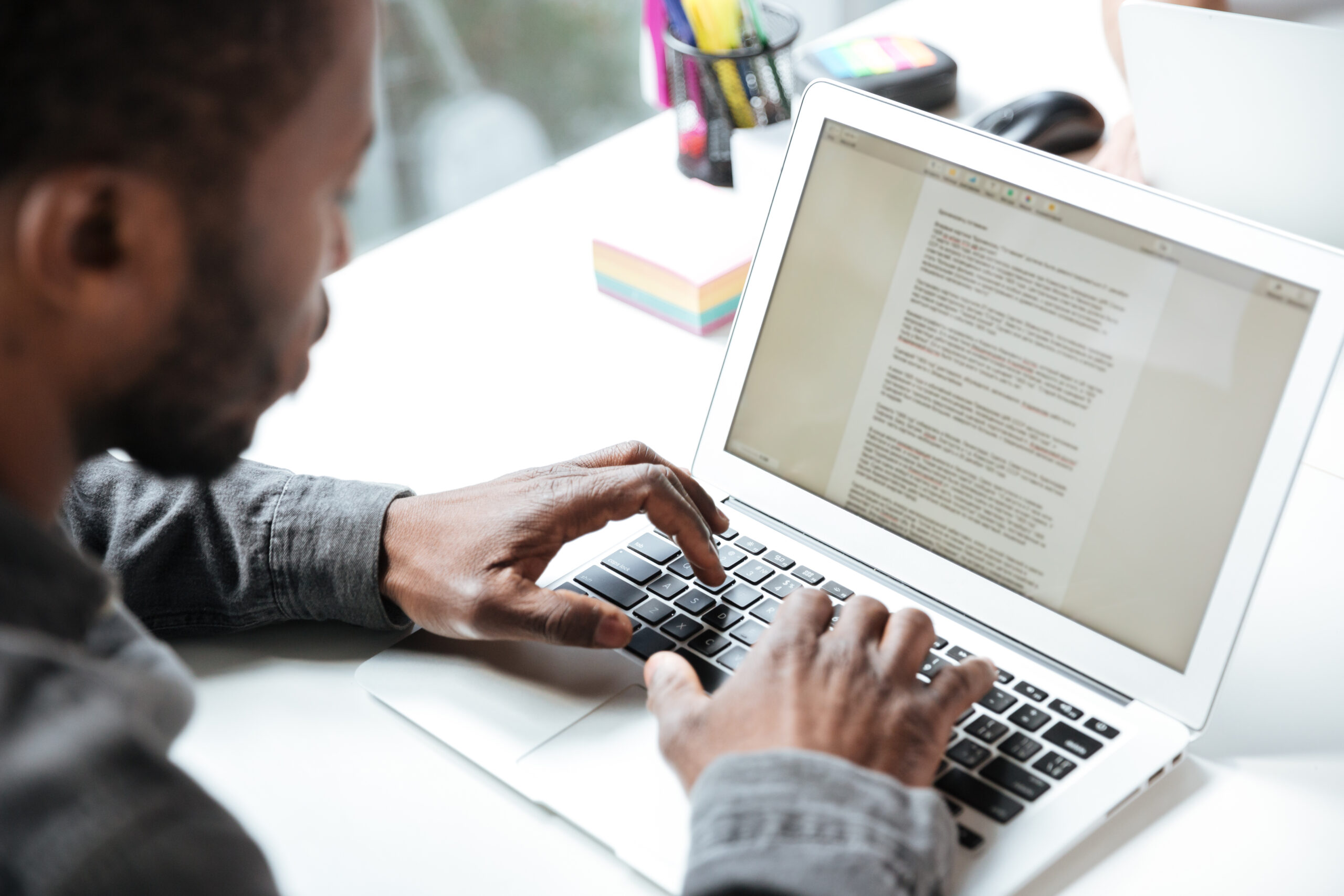 A person writing First-Person Authority Content